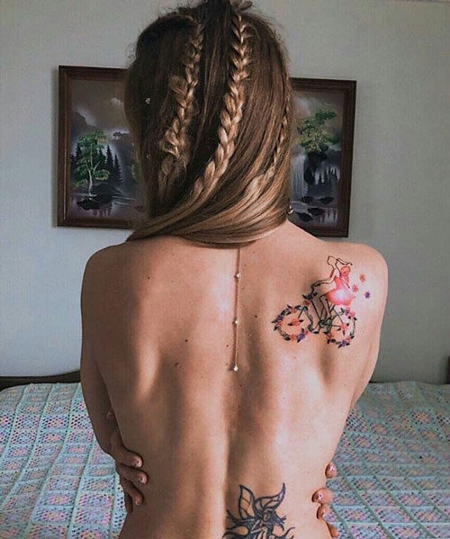 tatuaje de bici floral