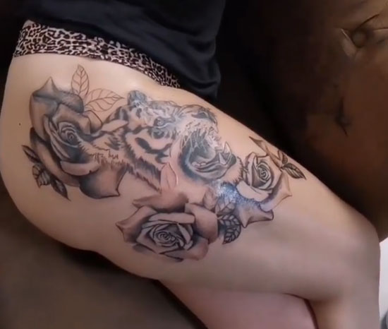 tatuaje pierna de un tigre