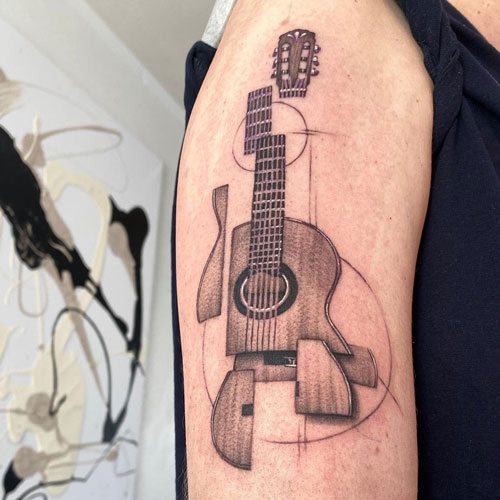 tatuaje surrealista guitarra