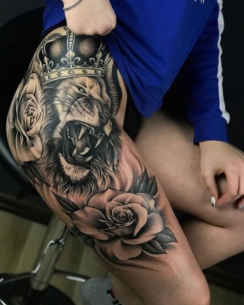 tatuaje en pierna de leon con corona