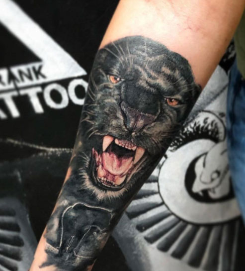 panther tatuaje brazo