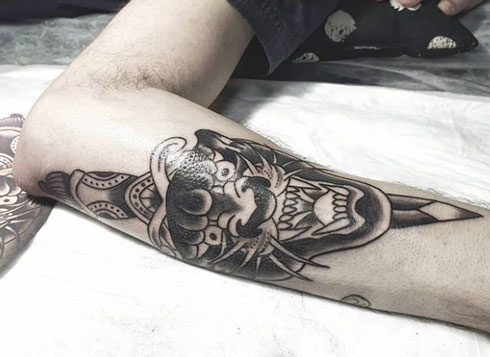 tatuaje daga y pantera