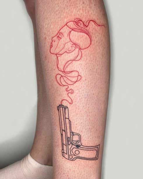 tatuaje para mujer de pistola